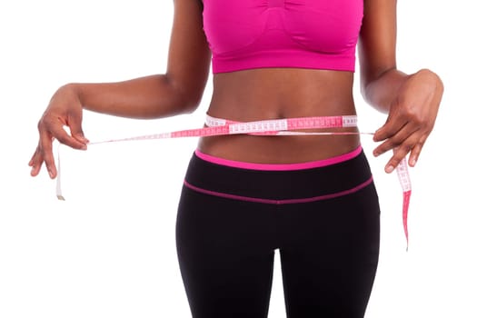 African American Fitness woman measuring her belly, isolated on white background
