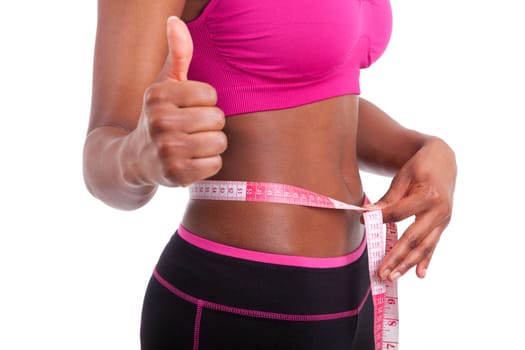 African American Fitness woman making thumbs up, isolated on white background