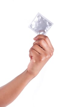 Safe sex concept. African woman Hand with condom, isolated on white background