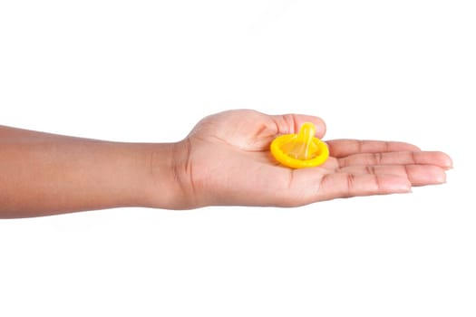 Safe sex concept. African woman Hand with condom, isolated on white background