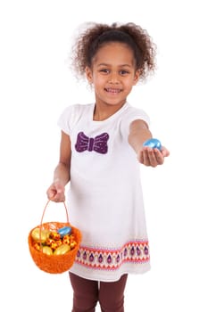 African Asian girl holding chocolate ester egg, isolated on white background