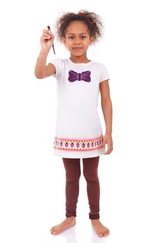 Young african asian girl holding  a paint brush,isolated on white background