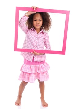 Portrait of a cute little african american girl, holding a picture frame,isolated on white background