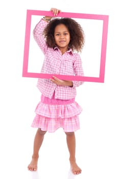 Portrait of a cute little african american girl, holding a picture frame,isolated on white background