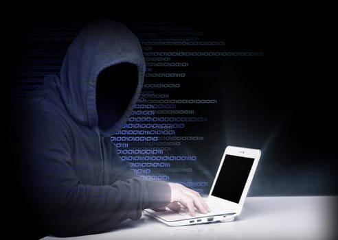 portrait of hacker with binary code