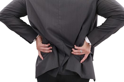 Young businessman having some lower back pain