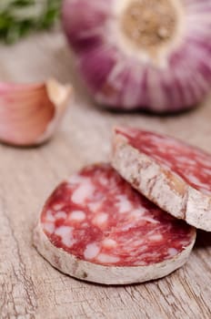 Salami sausage as a close-up and in portrait format