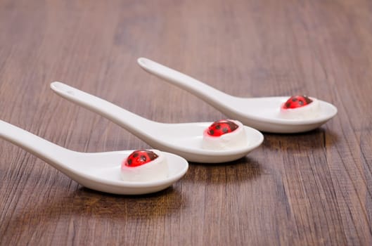 3 spoons of cream cheese and sugar ladybugs