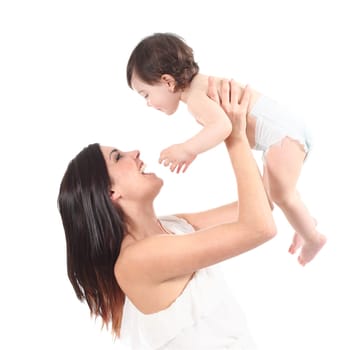 Attractive mother laughing and raising her daughter isolated on a white background