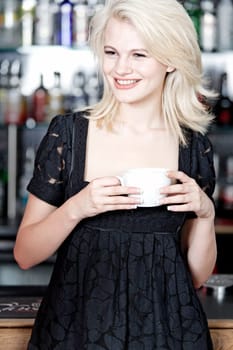 attractive woman waiting for someone at a wine bar.