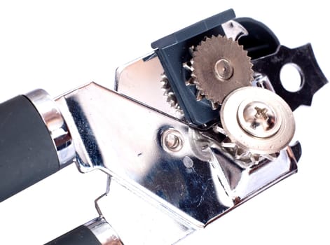 Can opener mechanism close up on a white background