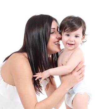 Attractive mother embracing her baby isolated on a white background