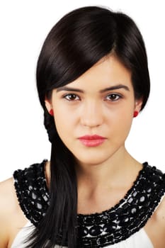 Portrait of a beautiful young woman looking at camera isolated on white.