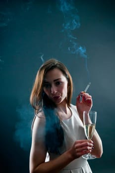 Woman with cigarette and alcohol