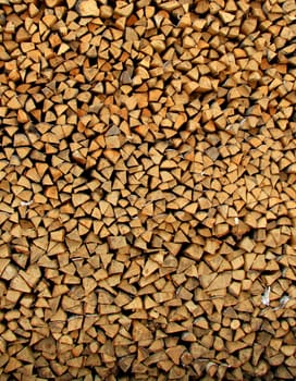 Wooden logs stacked in series