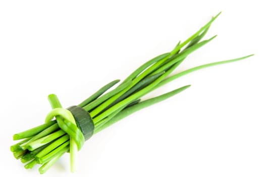 green fresh chive on white background