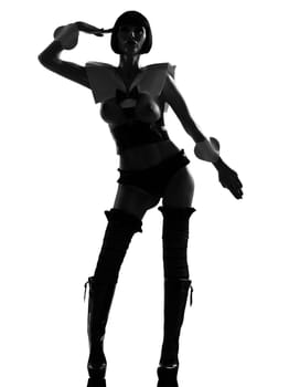 one sexy caucasian sexy woman dressas a maid or soldier silhouette in studio isolated on white background