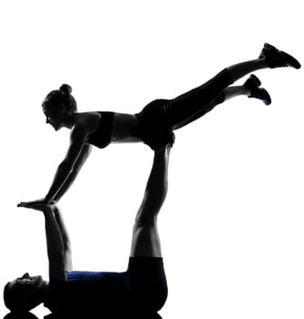 couple woman man exercising workout fitness aerobics posture in silhouette studio isolated on white background