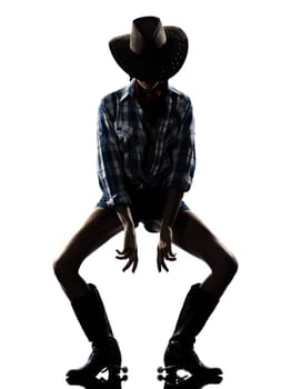 one woman cowgirl  dancer happy dancing country music in studio isolated on white background