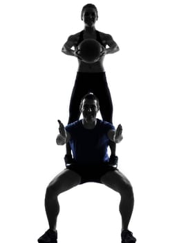 couple woman man exercising workout fitness aerobics posture in silhouette studio isolated on white background
