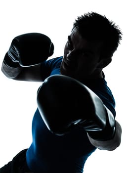 one caucasian man exercising boxing boxer  workout fitness in silhouette studio  isolated on white background