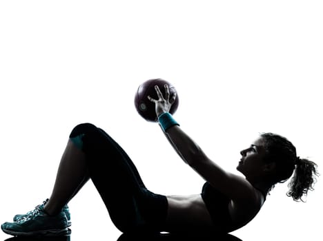 one caucasian woman exercising fitness ball workout posture in silhouette studio isolated on white background
