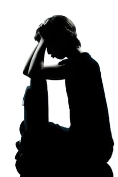 one caucasian young teenager silhouette boy or girl pouting sadness  full length in studio cut out isolated on white background