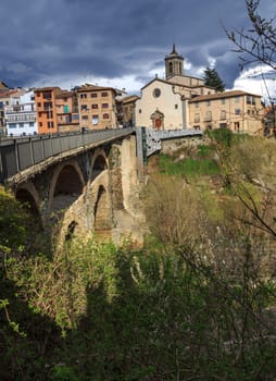 Roda del Ter, Catalan village, with its Roman bridge input and church in the background.
