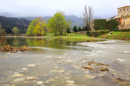 Fluvia river passing through besalu, pretty rural scene Catalan, Spain