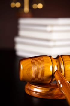 Judges wooden gavel and law books
