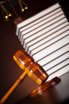 Judges wooden gavel and law books