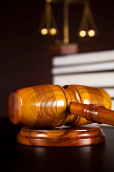 Judges wooden gavel and law books