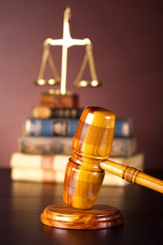 Wooden gavel and books