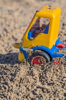 Toy car in the sandbox