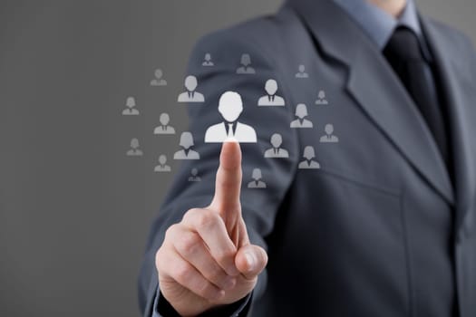 Human resources officer choose employee standing out of the crowd. Select team leader concept. Gender discrimination in employees selection.