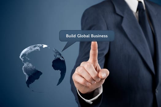 Build global business concept. Planet Earth and man click on Build Global Business button.