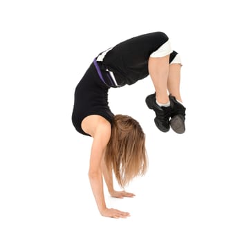 Freestyle woman dancer against white background.