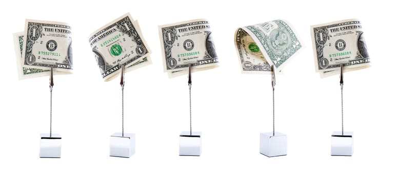Five american dollars banknotes in a row isolated