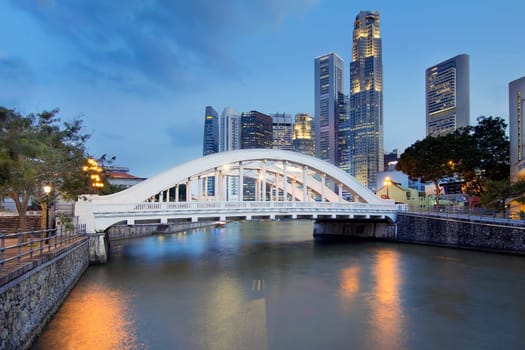 Singapore Central Business District (CBD) City Skyline by Elgin Bridge Over Singapore River at Blue Hour