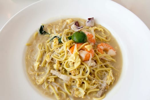 Hokkien Stir Fry Yellow Noodles and Rice Noodles with Prawns Squids Eggs and Pork