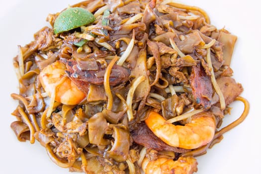 Singapore Char Kway Teow Rice Noodle Stir Fry with Prawns Chinese Sausage and Fishcake Closeup