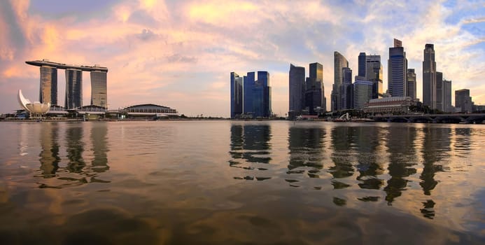 Reflection of Singapore Central Business District Skyline Along Singapore River at Sunset Panorama