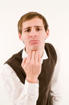 Upper body shot of a young man in front of a white background gesturing in Italian  Looking at the camera