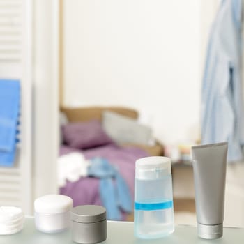 Bathroom shelf with beauty cosmetics and toiletries