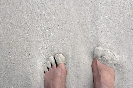 Barefoot in the sand