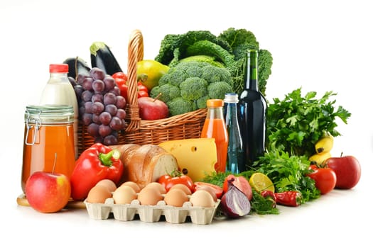 Grocery products including vegetables, fruits, dairy, bread and drinks isolated on white