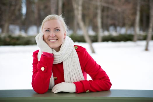 Woman relies at terrace boundary have happy thoughts