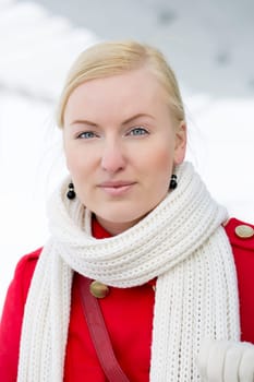 Young grey eyed woman looking straight on camera