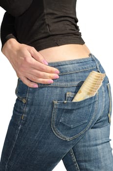 Woman in jeans with fan of euro banknotes in back pocket isolated on white