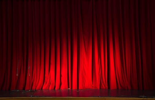 Red stage curtain hide coming show action preparations